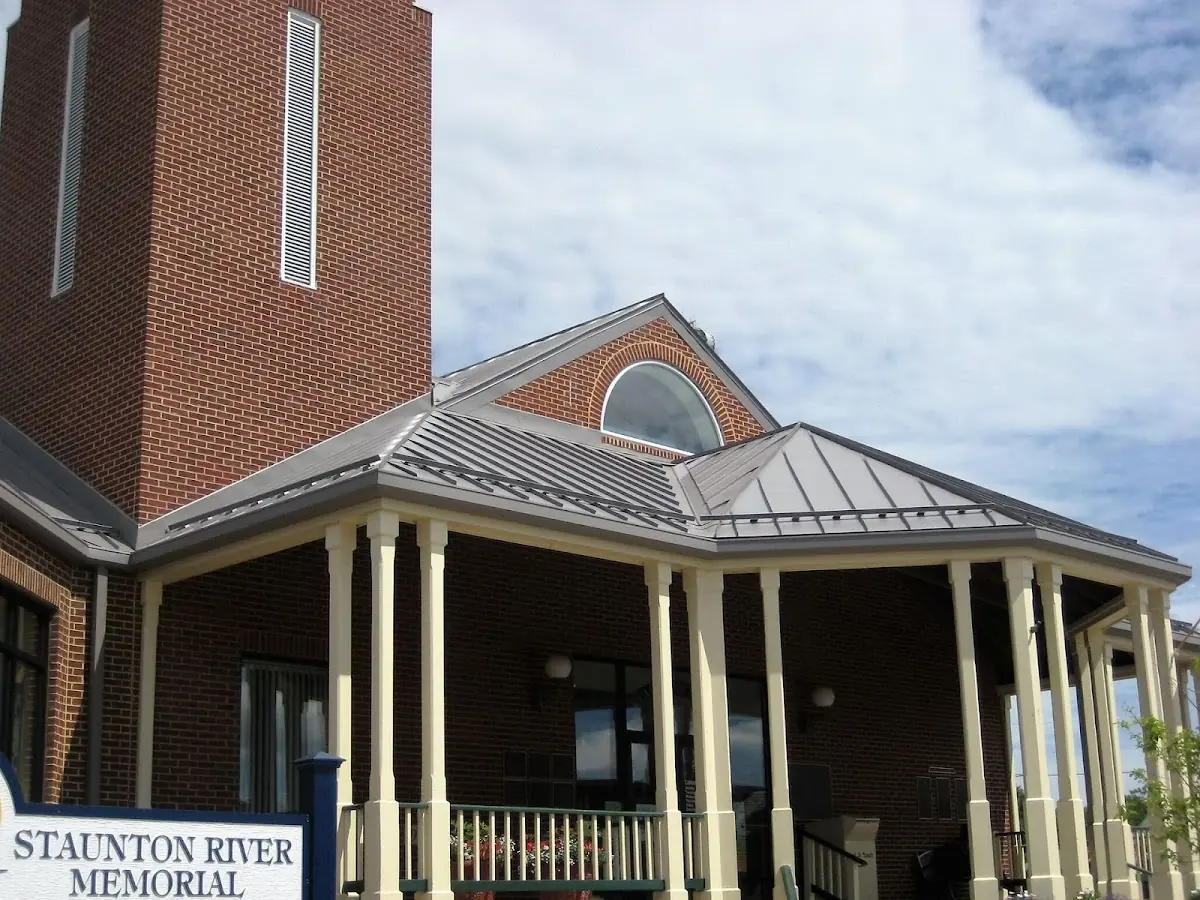 Skilled roofing craftsmen working on a residential roof in Ninety Six Corners